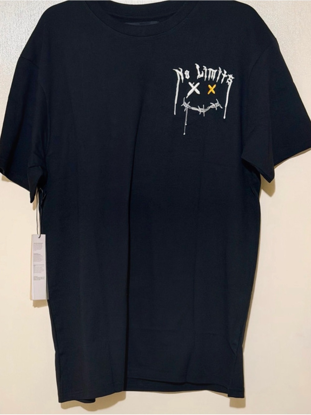 Reason Black T-Shirt with White and Yellow 'No Limits' Graphic
